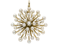 thumbnail of An antique starburst-form yellow gold pendant with pearls radiating out from a center diamond, shown on white background