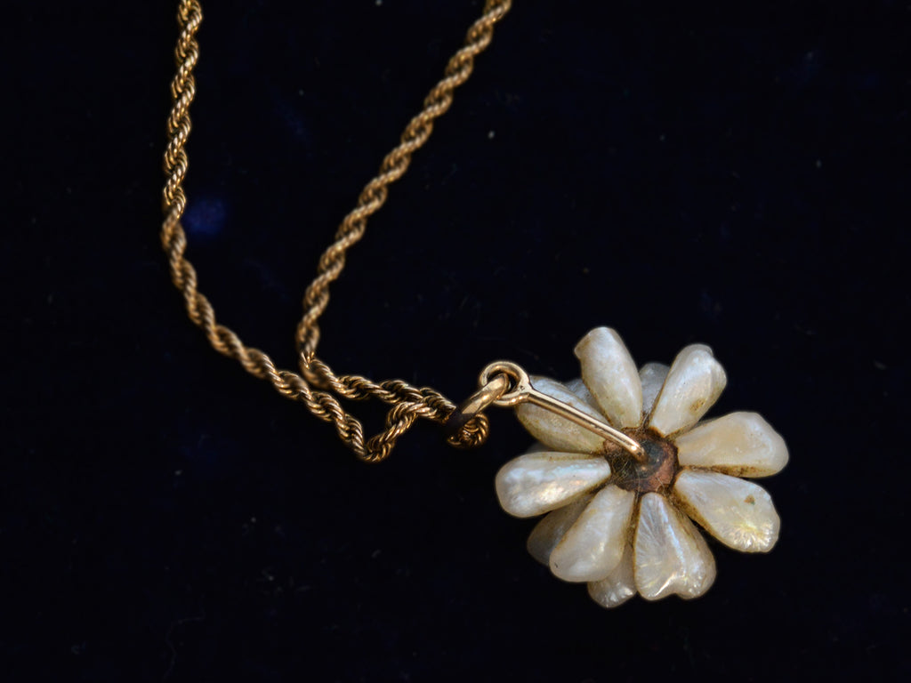 Reverse side view of c1910 Pearl Flower Necklace (shown on black background)