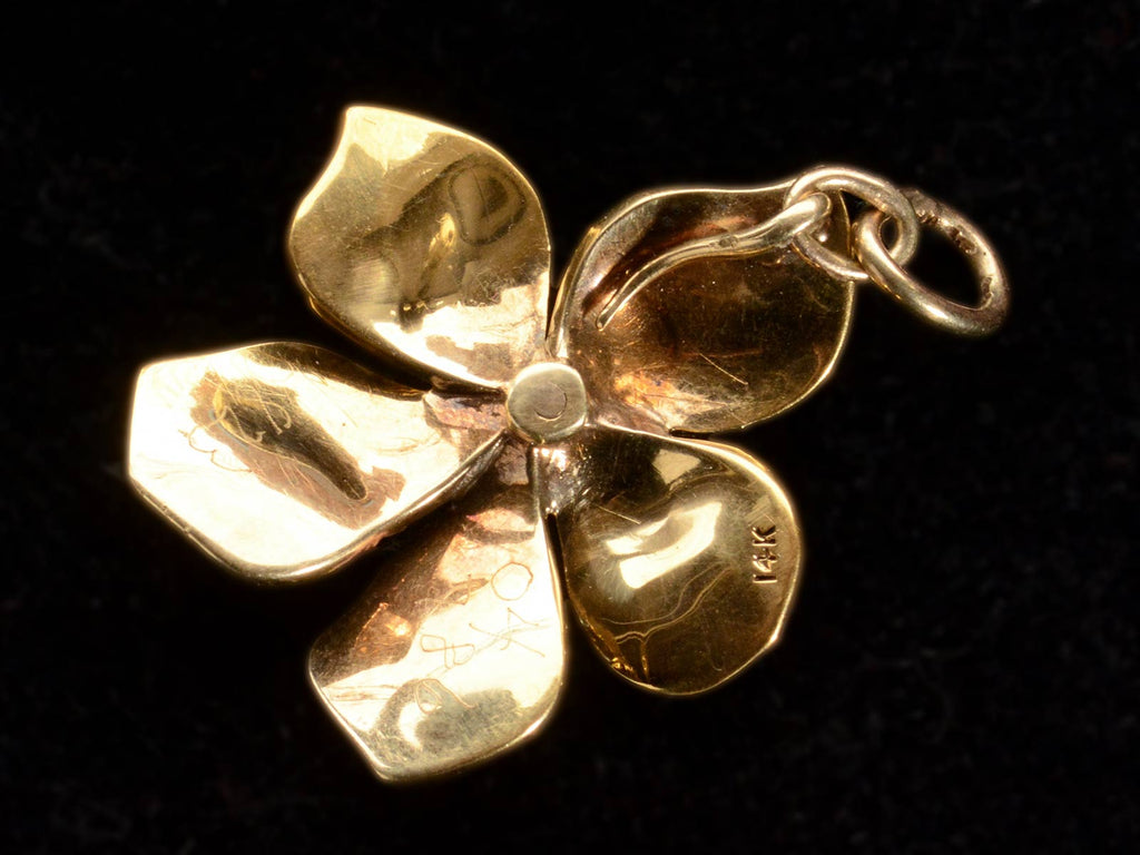 Reverse side of c1900 Pearl and Diamond Pansy Pendant in Yellow Gold (on black background). "14K" mark is visible.