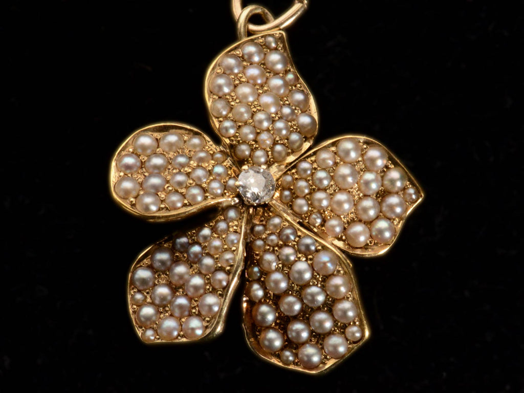 Front of c1900 Pearl and Diamond Pansy Pendant in Yellow Gold (on black background)