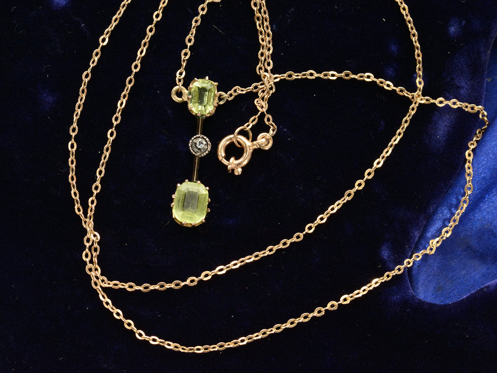 c1910 Peridot & Diamond Necklace (detail of chain on black background)