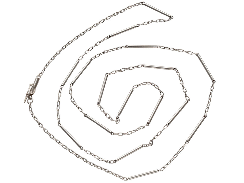 Art Deco platinum chain with cable and bar links, shown spiraled on white background.