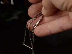 thumbnail of Detail view of Art Deco platinum chain with cable and bar links, shown held in hand