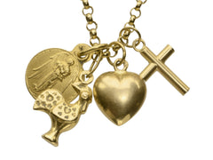thumbnail of Detail of vintage 19k yellow gold Portuguese charm necklace with four charms: a devotional medallion of Christ, a rooster, a heart, and a cross. Shown on white background. 