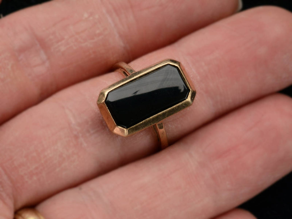 c1920 Rectangular Onyx and Yellow Gold Signet Ring (on finger for scale)