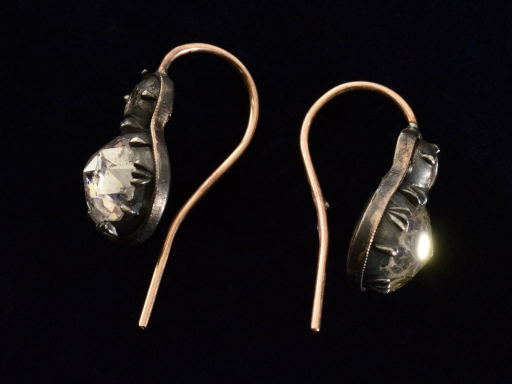 Side profile views of c1820 Rose Cut Diamond Earrings (on black background)