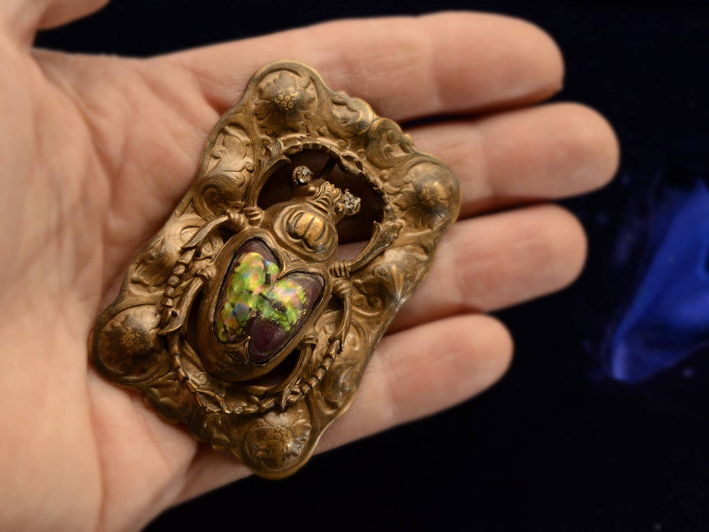 c1900 Scarab Sash Pin (in hand for scale)