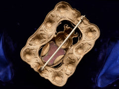 thumbnail of Reverse side of c1900 Scarab Sash Pin (on dark blue background)