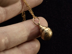 thumbnail of 1960s Gold Shell Necklace (on hand for scale)