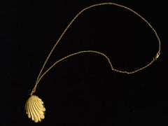 thumbnail of Victorian shell pendant necklace shown with chain on black background.