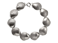 thumbnail of A silver bracelet with scallop shell links, on white background.