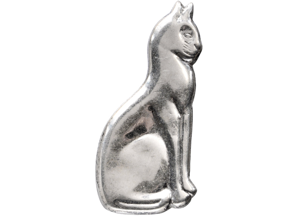 A vintage silver cat brooch, shown on white background.