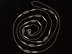 c1900 Long Filigree Chain (on black background)