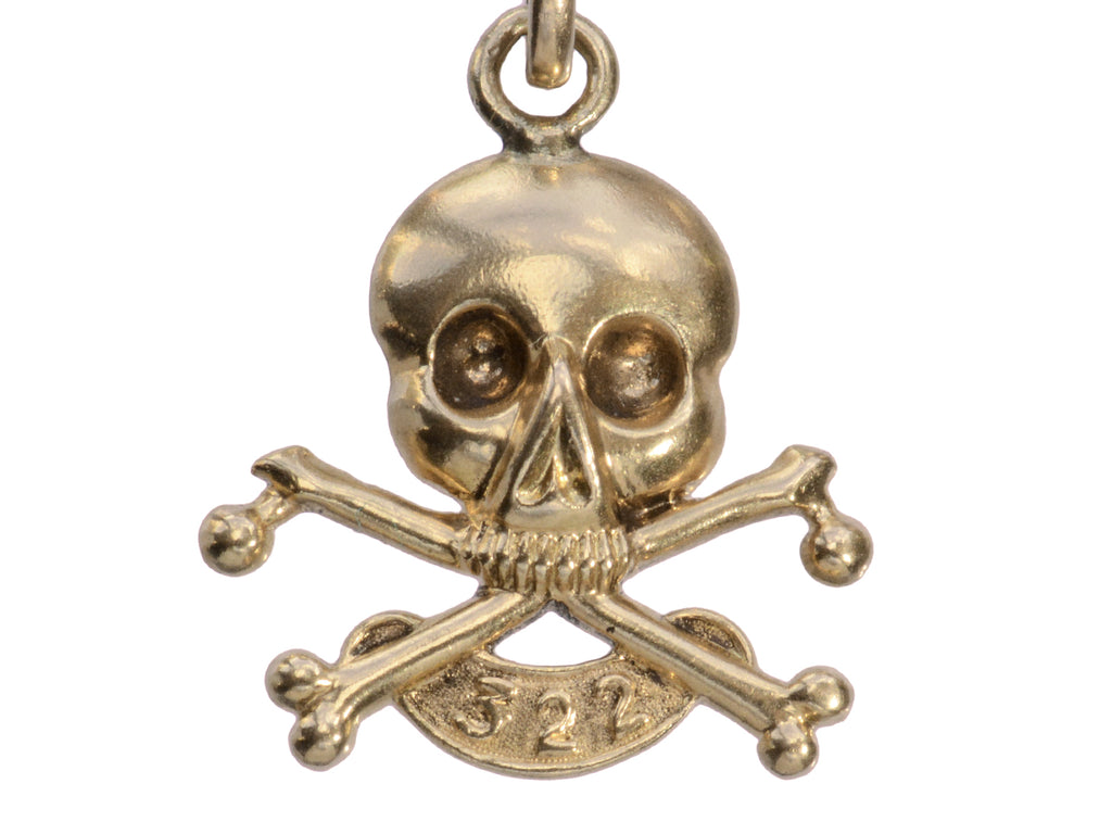 c1920 Skull & Bones Charm with the number 322 (shown on white background)