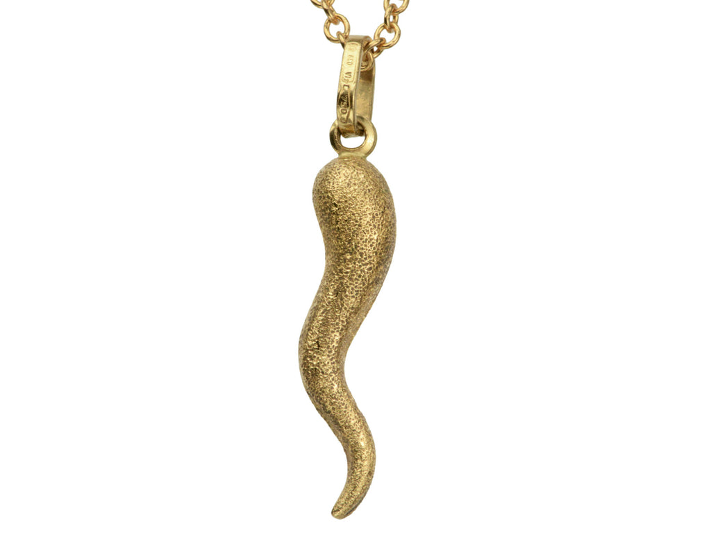 Vintage textured gold Italian cornicello charm on chain, with markings on the bale reading "860 VI 750". On white background.