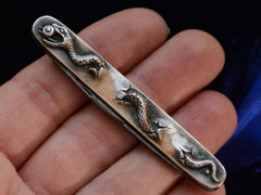 thumbnail of c1910 Silver Snake Knife (on hand for scale)