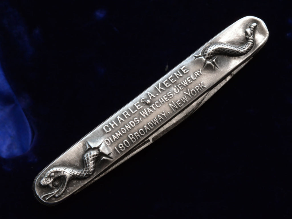 c1910 Silver Snake Knife (reverse side showing advertisement for "Charles A Keene: Diamonds, Watches, Jewelry 180 Broadway, New York)