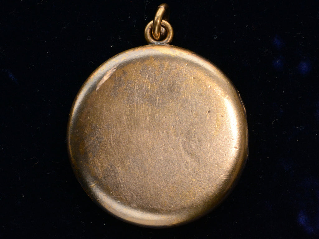 c1890 Rose Gold Colored Snake Locket with Diamond Head (reverse side shown on black background)