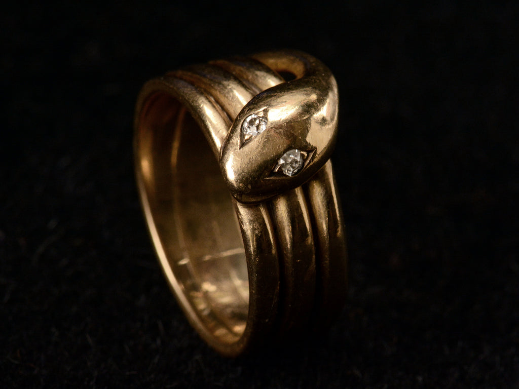 c1890 Diamond and Gold Snake Ring (angled view on black background)