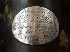 thumbnail of Detail view of plaque on snuff box that reads "Presented to Mr Will Affleck by the Caldeonian Gardeners Lodge Edin. for the 2nd best Auricula 1811"