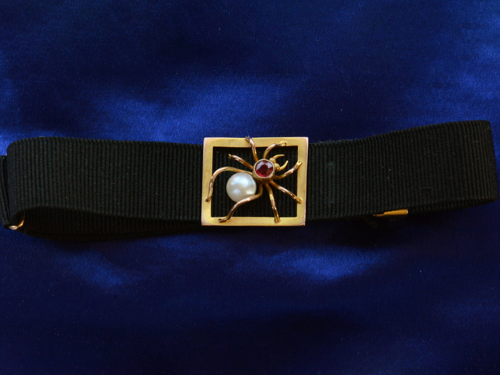 c1900 Spider Bracelet on Black Ribbon (shown on dark blue background)