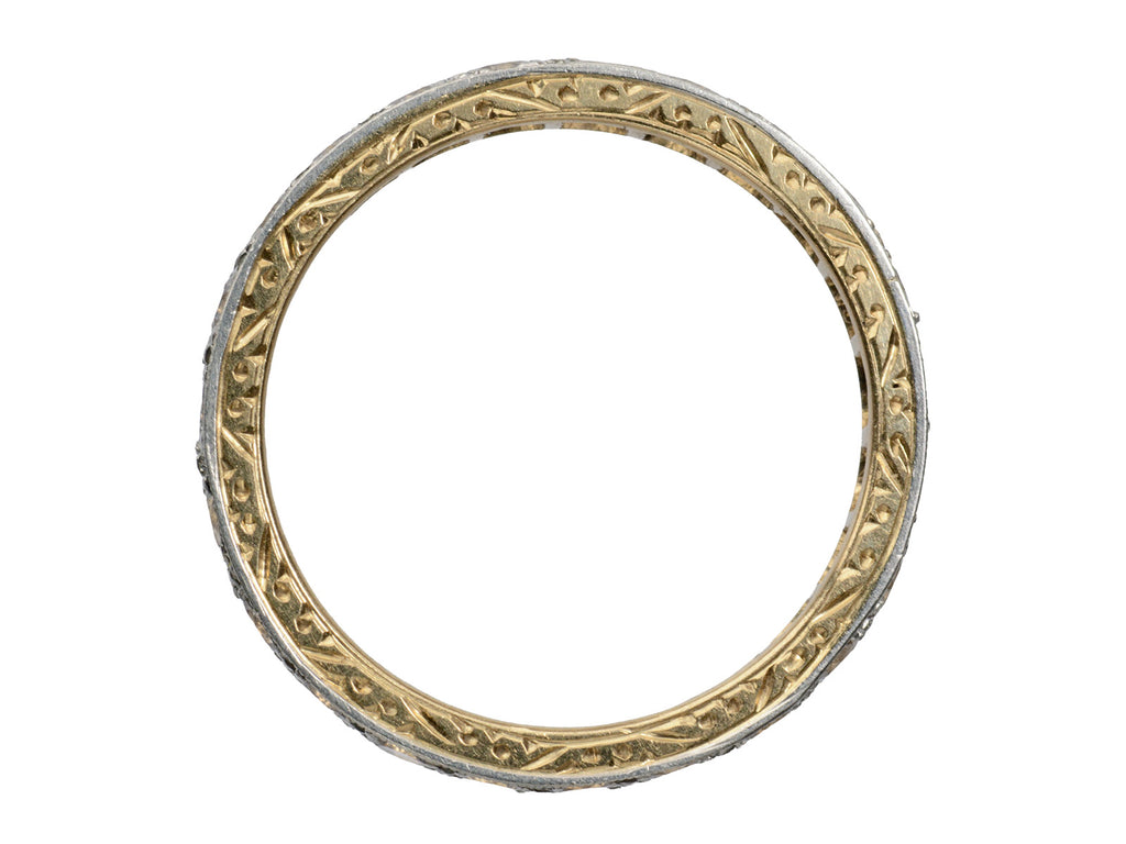 Side profile of c1920 Gold and Platinum Eternity Band showing carved detailing, on white background.