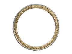 thumbnail of Side profile of c1920 Gold and Platinum Eternity Band showing carved detailing, on white background.