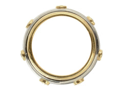 thumbnail of Side profile of a vintage two-toned yellow and white gold diamond eternity band with a spinning mechanism. Shown on white background.