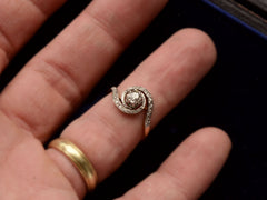 thumbnail of Antique Art Nouveau spiral form with diamonds in platinum-topped gold, shown on finger