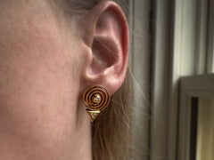 thumbnail of c1970 Diamond Spiral Earrings (worn on ears for scale)