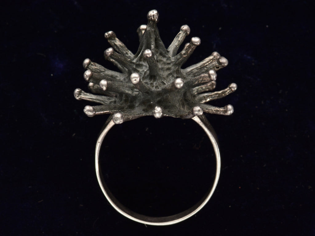 c1960 Silver Sputnik Ring (side profile view on black background)