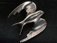 thumbnail of A c1950 Silver Dove Brooch on dark textured background