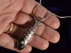 thumbnail of c1960 Articulated Fish Necklace (on hand for scale)