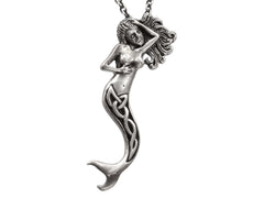thumbnail of Detail of vintage silver mermaid pendant with Celtic design on tail, shown on white background.