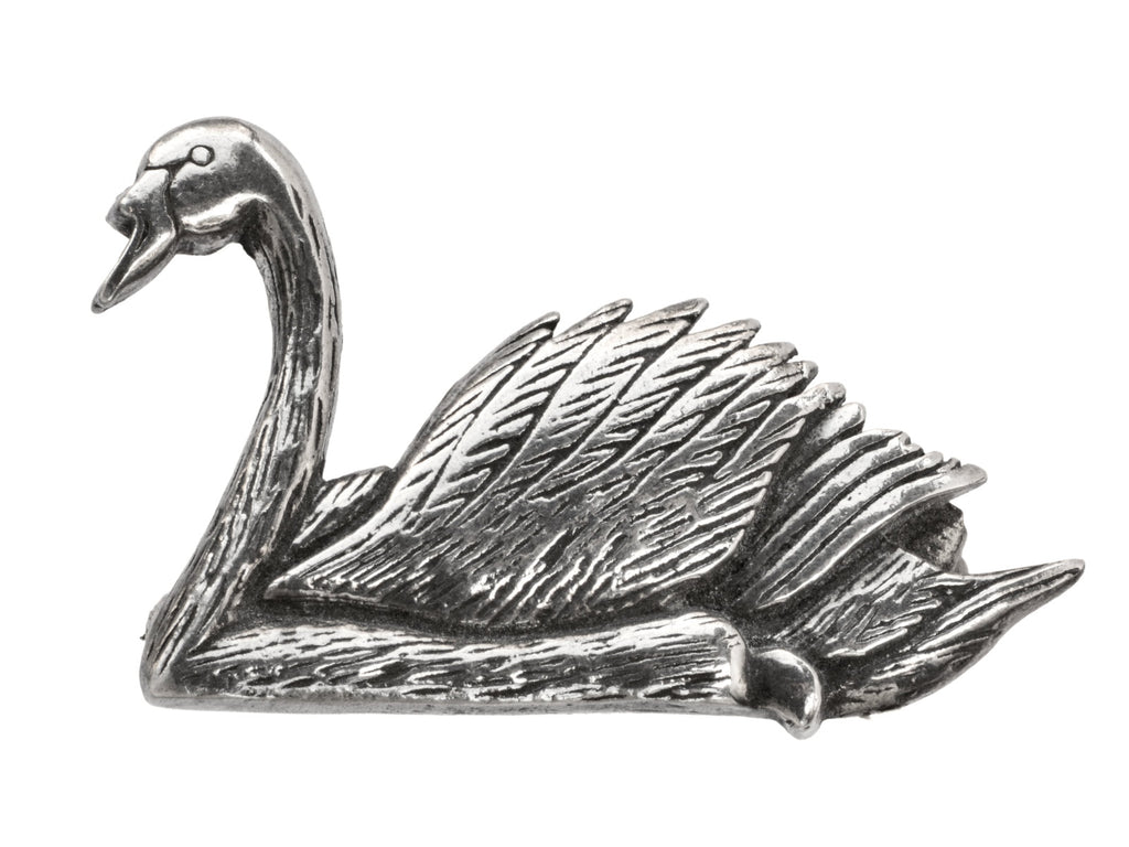 A sterling silver swan brooch on white background.