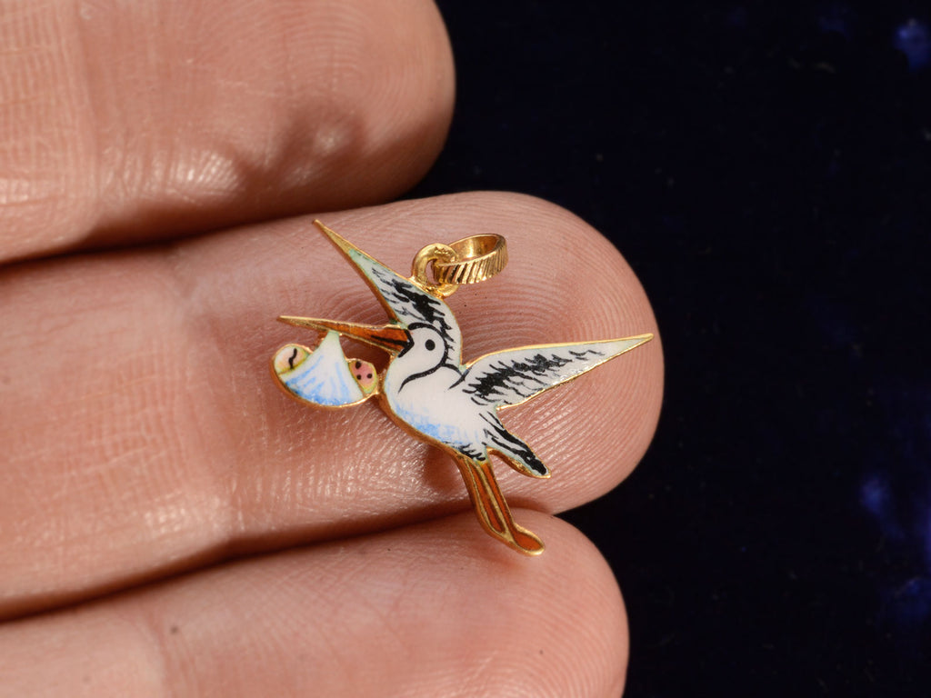 c1950 Enamel Stork Charm (shown on finger for scale)