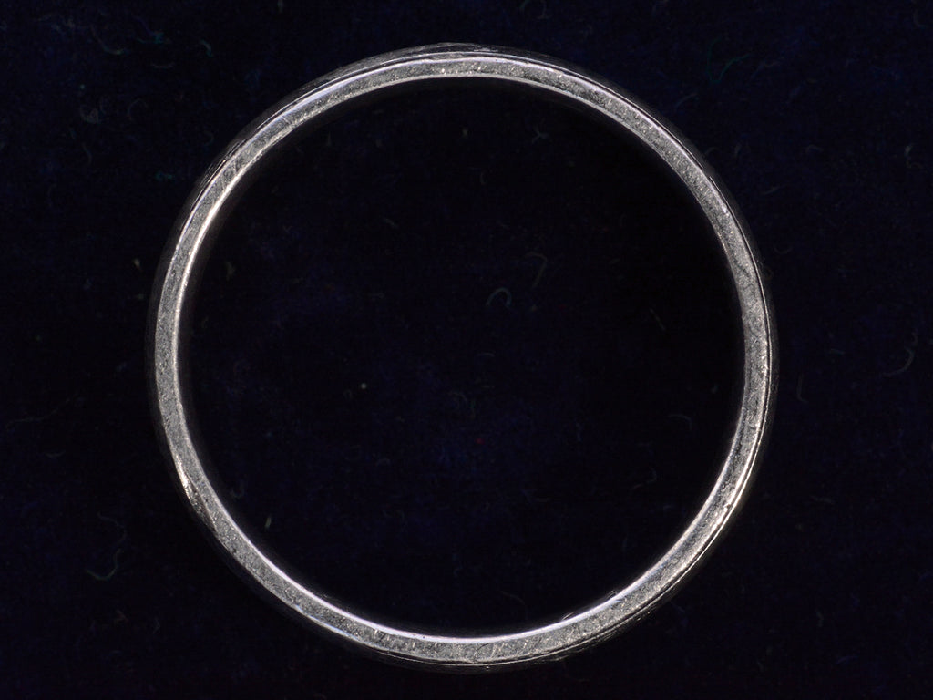 Side profile view of c1980 Striped Platinum Band (on dark blue background)