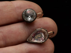 thumbnail of Mismatched earrings made from pink foiled silver set buttons on gold ear wires. On hand.
