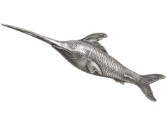 thumbnail of Antique silver sewing stiletto in the form of a swordfish, shown on white background.