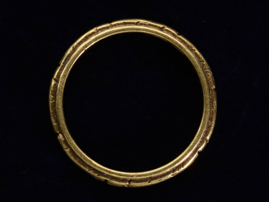 Side profile view of 1921 Decorated 18K Yellow Gold Band (on dark background)