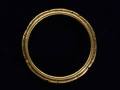 thumbnail of Side profile view of 1921 Decorated 18K Yellow Gold Band (on dark background)