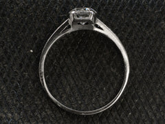 thumbnail of Side profile of a c1930 Art Deco Tiffany & Co platinum engagement ring shown on dark textured background.