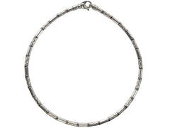 thumbnail of A vintage Tiffany "Aztec" necklace with barrel-shaped sterling silver beads interspersed with narrow bands of hematite and alternating with zig-zag embellished beads, shown on white background.