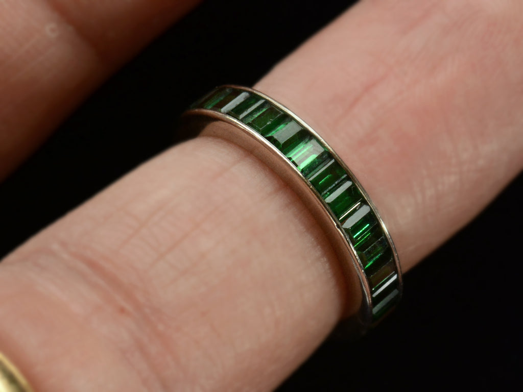 c1980 Green Tourmaline Eternity Band in White Gold (worn on a finger for scale)