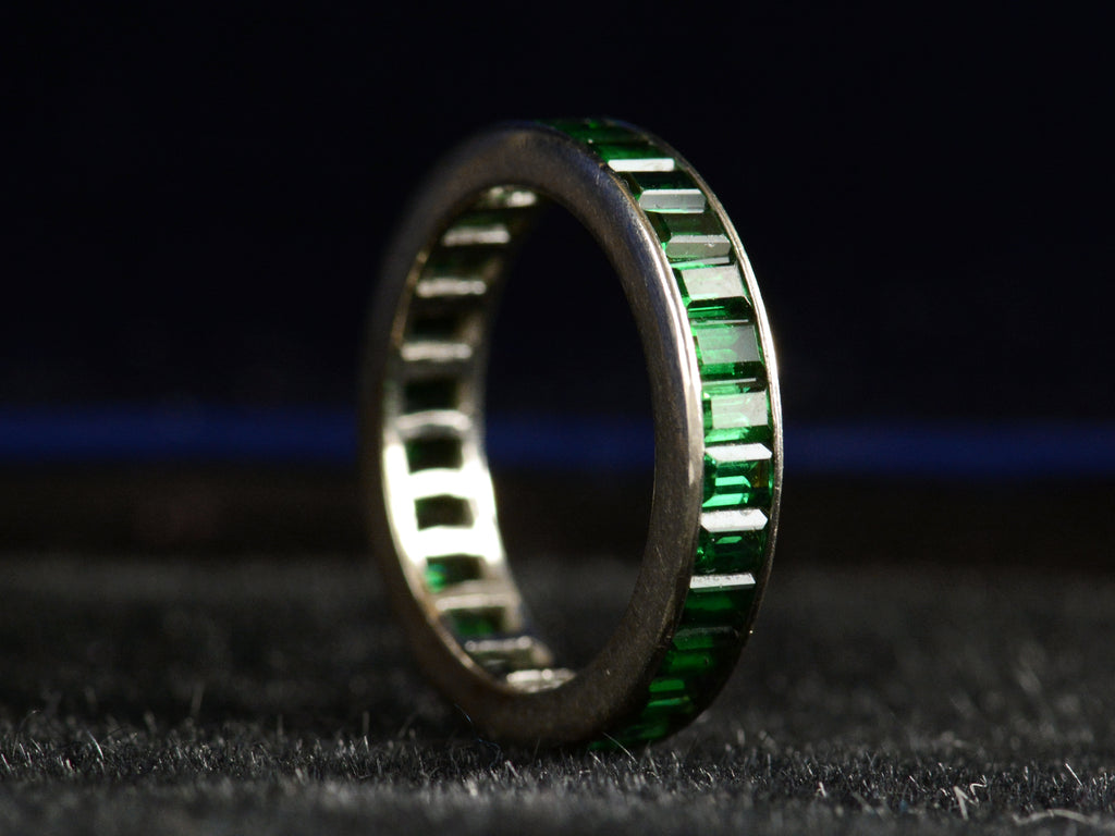 c1980 Green Tourmaline Eternity Band in White Gold (left side view on dark background)