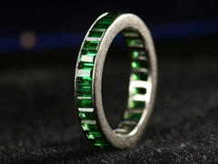 thumbnail of c1980 Green Tourmaline Eternity Band in White Gold (right side view on dark background)