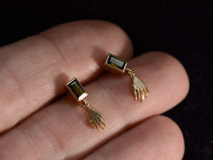thumbnail of EB Modern Earrings with Rectangular Olive Colored Tourmaline Tops and Hand Pendants in Yellow Gold (shown on hand for scale)