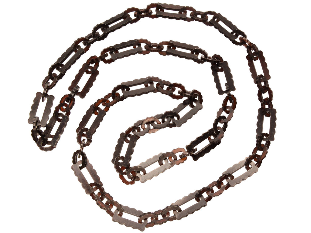 c1890 Long Tortoiseshell Chain (shown spiraled on white background)