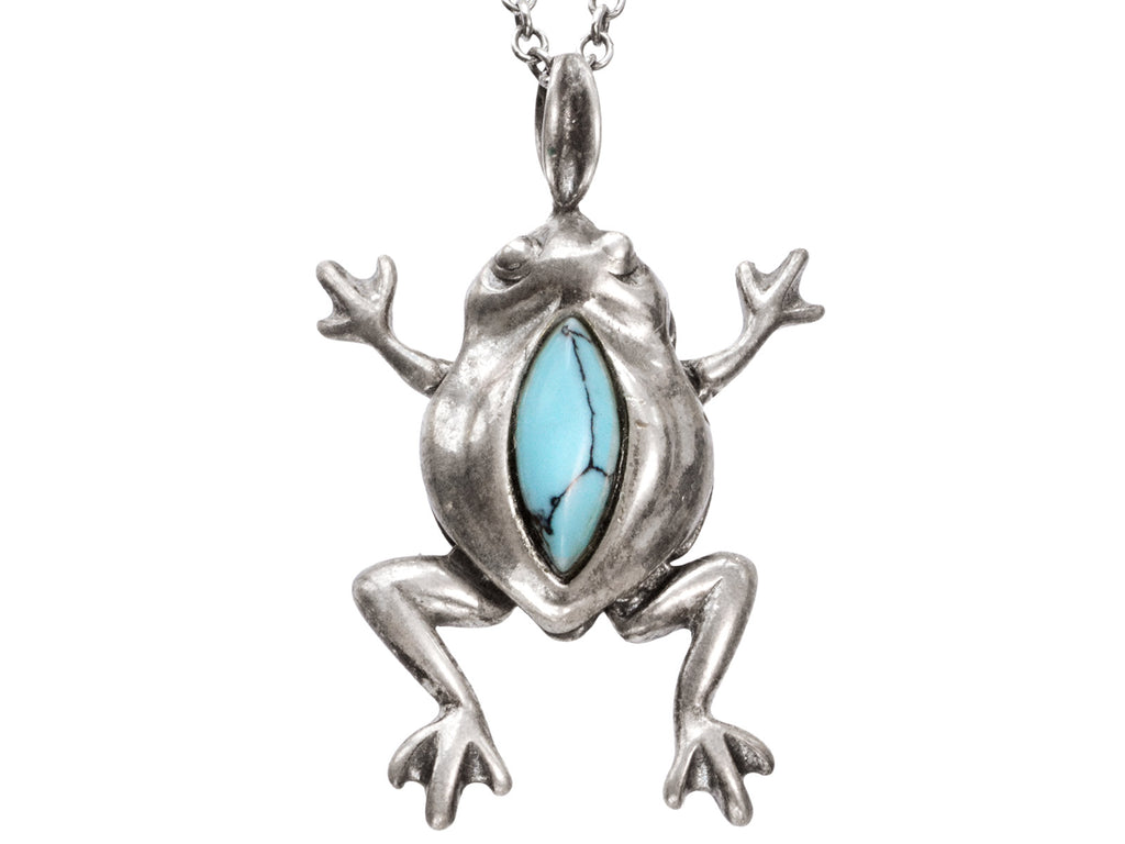 Silver frog pendant with turquoise stone on a white background