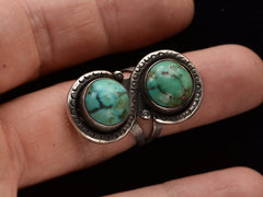 thumbnail of Front view of Silver ring with two turquoise stones on finger
